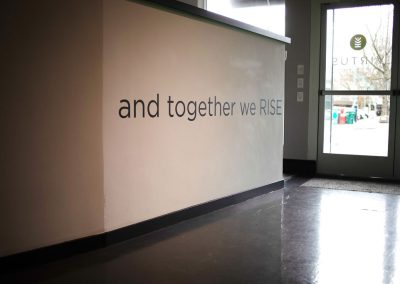 Kirkland location patient bay wall decal: "and together we RISE"