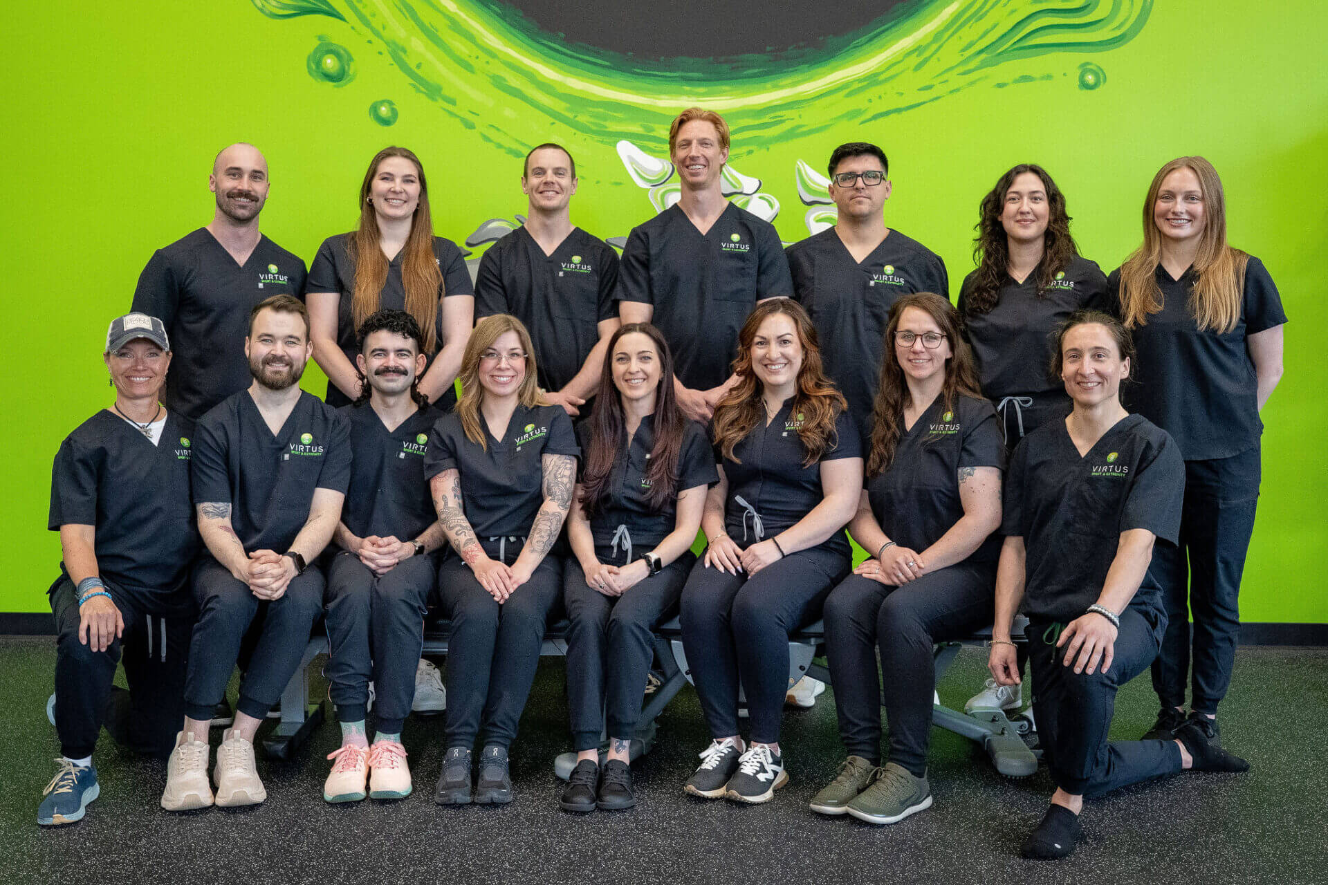 Virtus employee team smiling and looking at camera. 