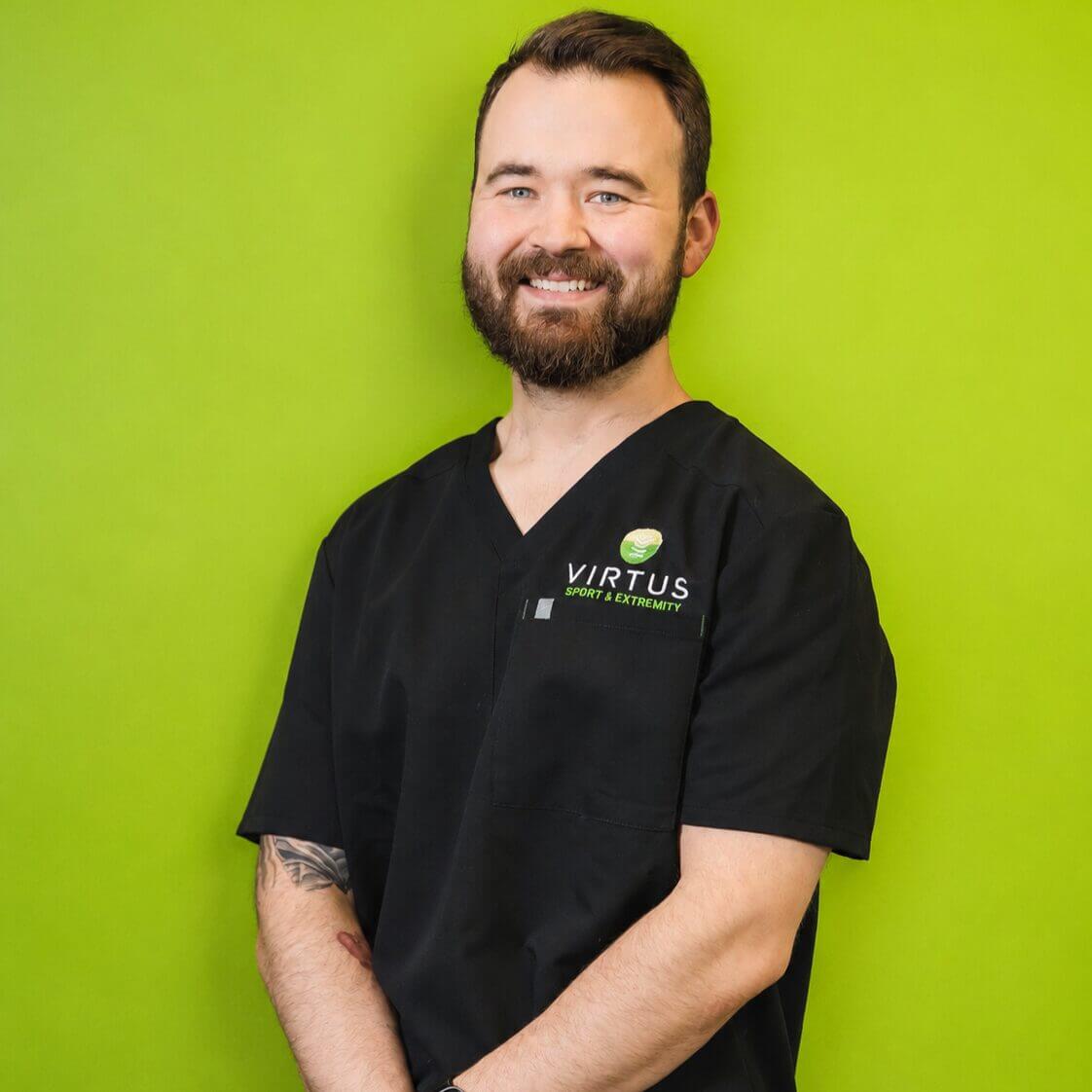 Dr. Tristan Maxwell smiling portrait